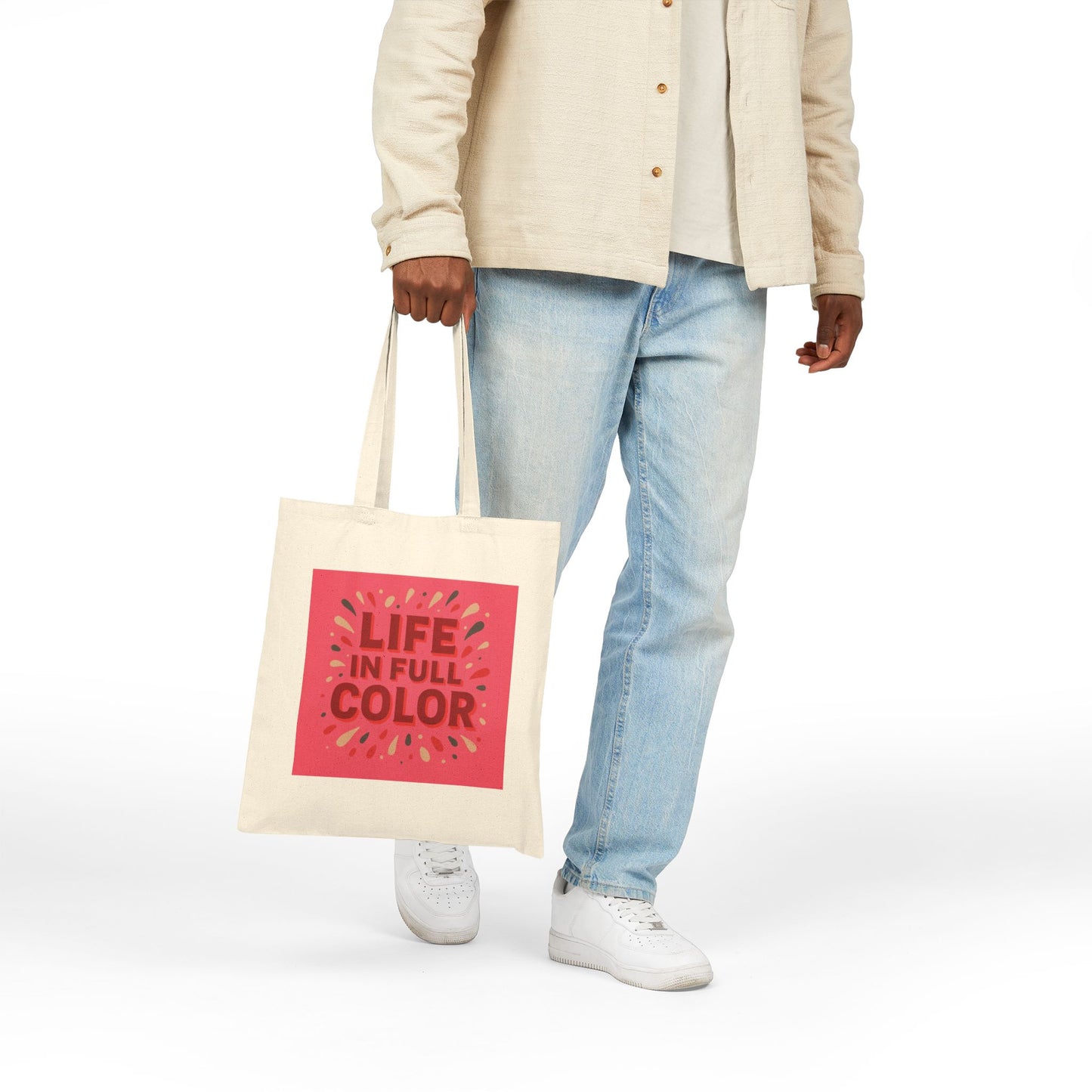 Cherry coded canvas tote bag featuring bold colors and the phrase 'LIFE IN FULL COLOR', ideal for vibrant outings.